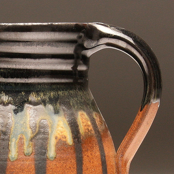 GH113 half-gallon pitcher woodfired black and gold