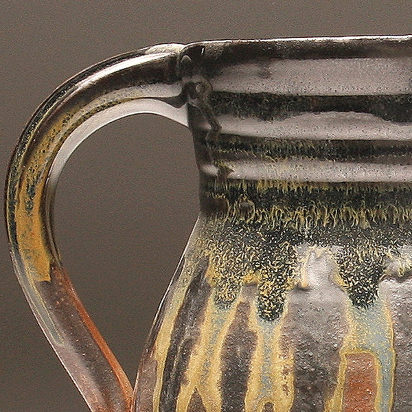 GH113 half-gallon pitcher woodfired black and gold