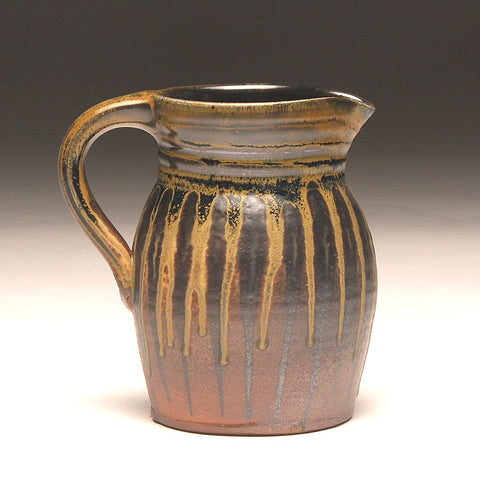 GH209 quart pitcher woodfired black, orange, and gold