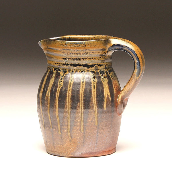 GH209 quart pitcher woodfired black, orange, and gold